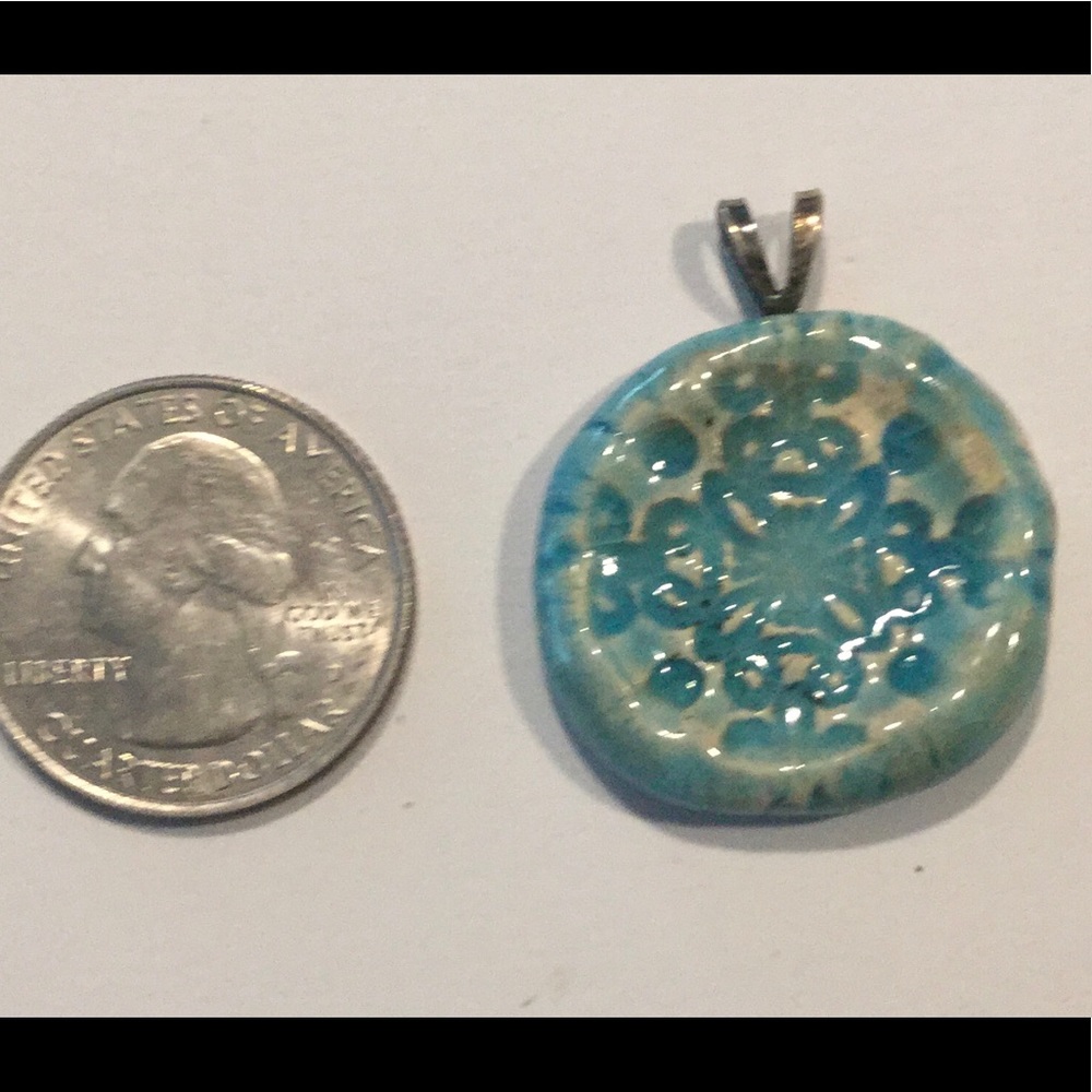 Aromatherapy clay fired pendant